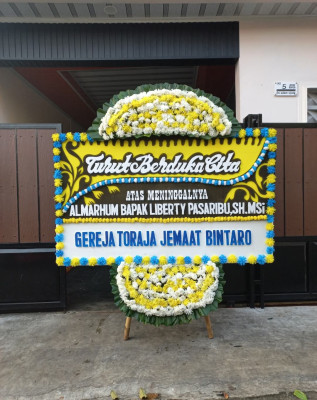Papan Bunga Duka di Batulo